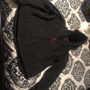 Black hooded rain jacket